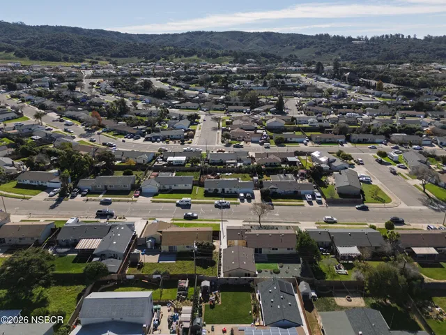 an aerial view of a city with lots of residential buildings