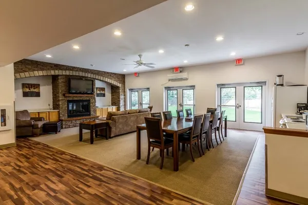 a kitchen with stainless steel appliances a refrigerator and stove