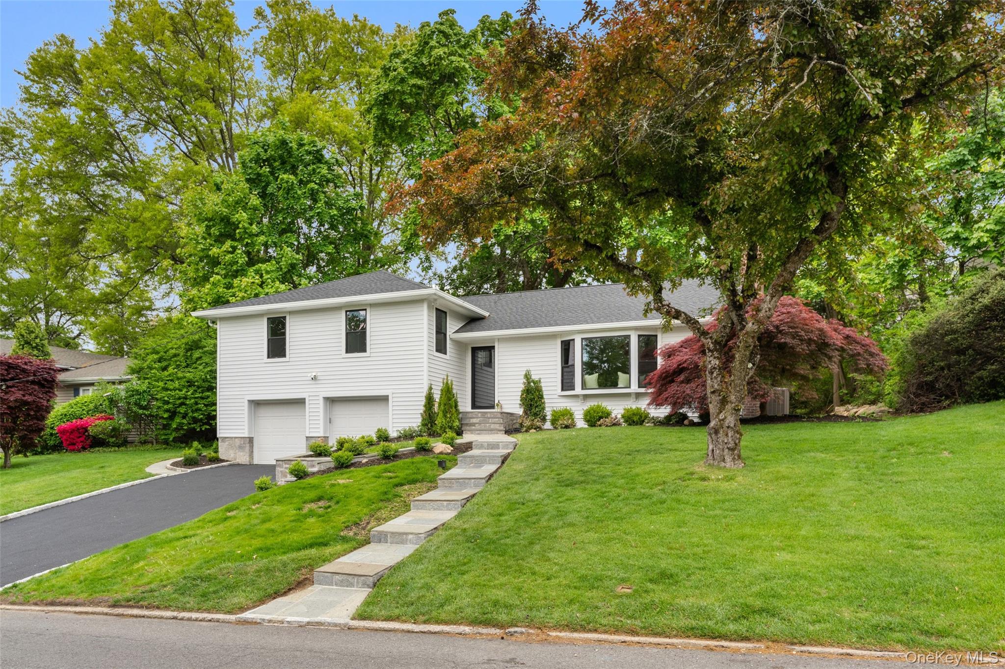 153 Waverly Road Scarsdale, NY 10583 - Photo 2 of 44 Front view with brand new driveway and walkway