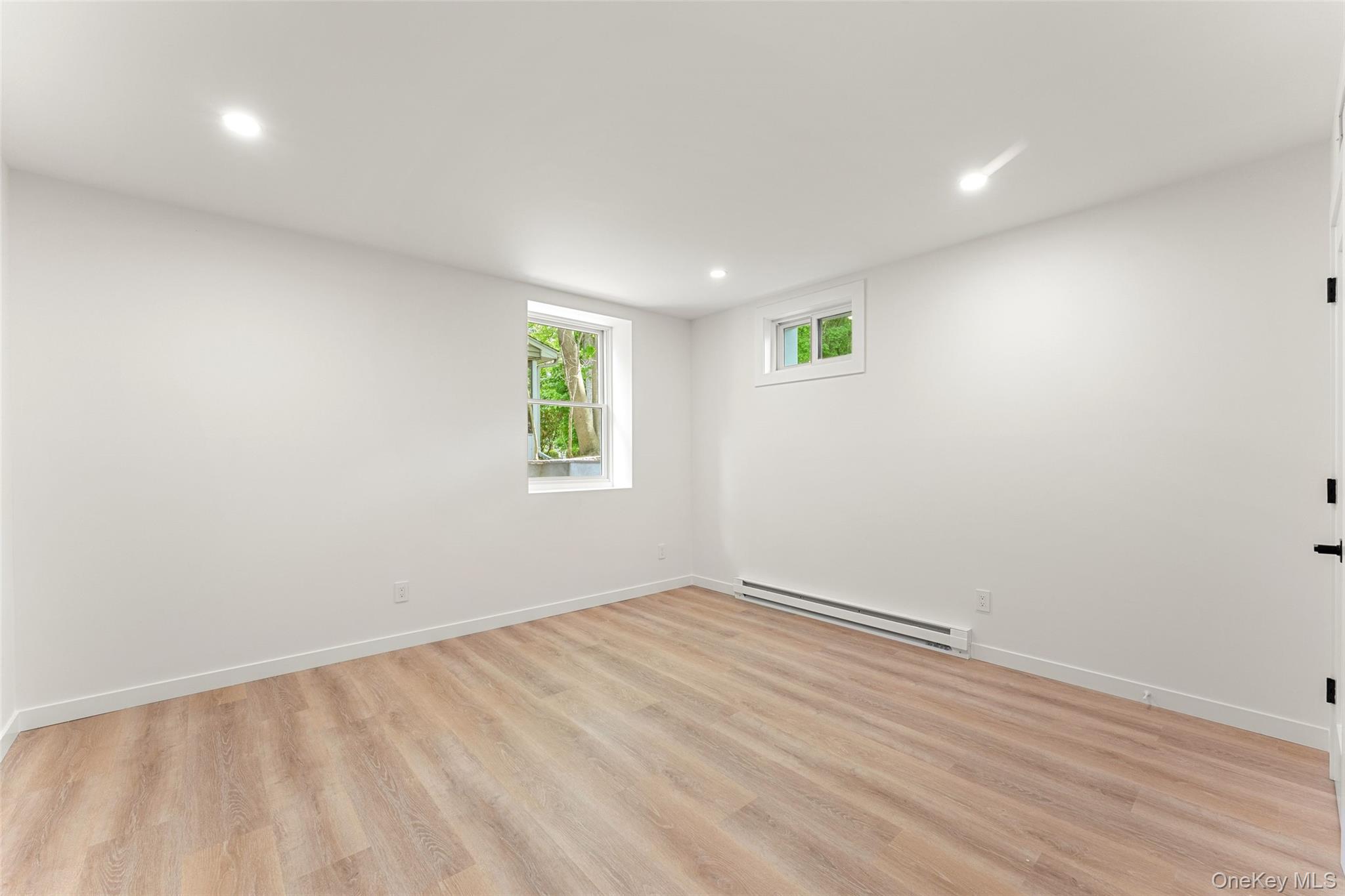 153 Waverly Road Scarsdale, NY 10583 - Photo 29 of 44 Bedroom 4 located downstairs. Large space, could be used as a bedroom/den/office/play room