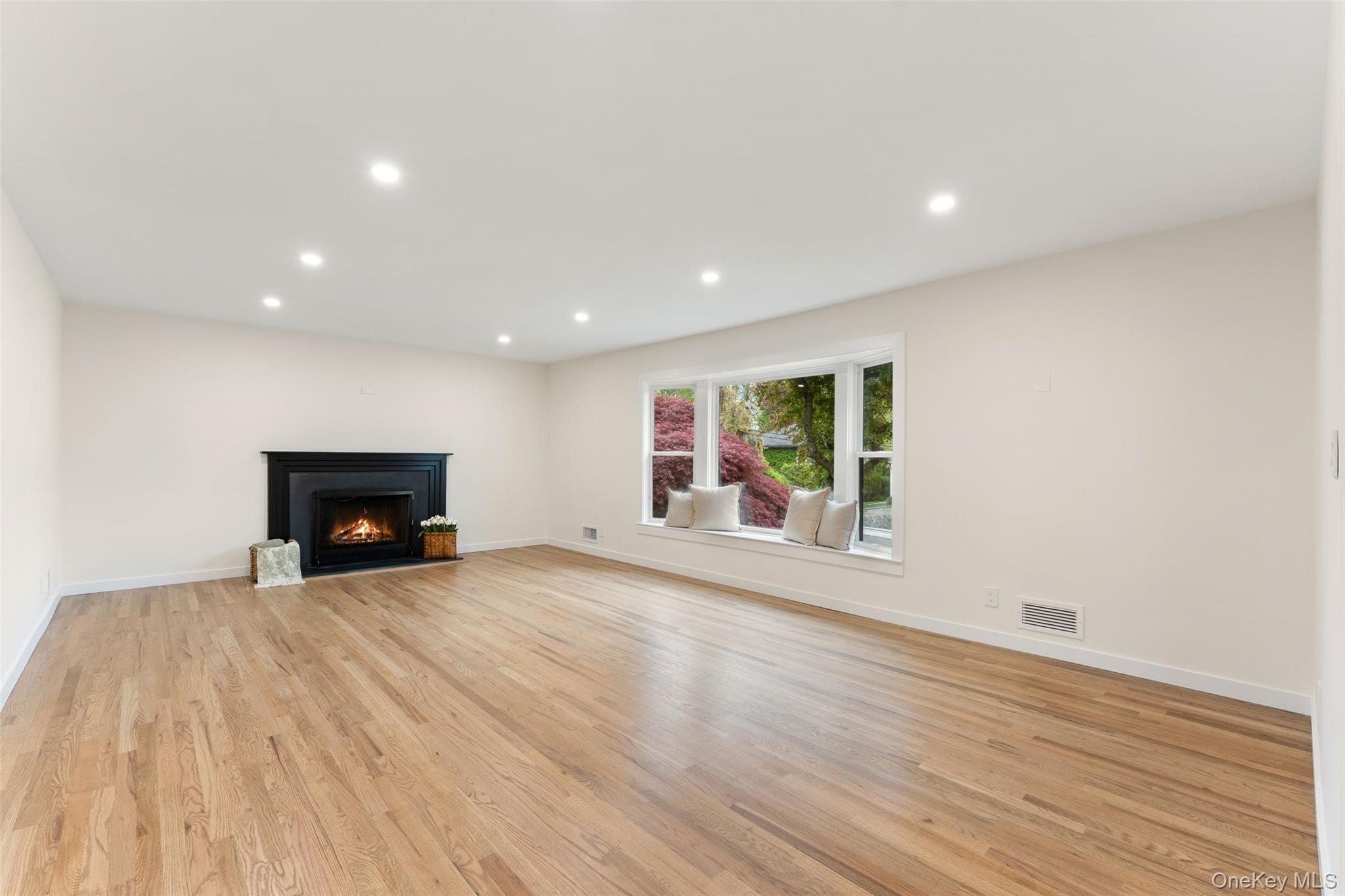153 Waverly Road Scarsdale, NY 10583 - Photo 4 of 44 Large Open Living Room with wood burning fireplace