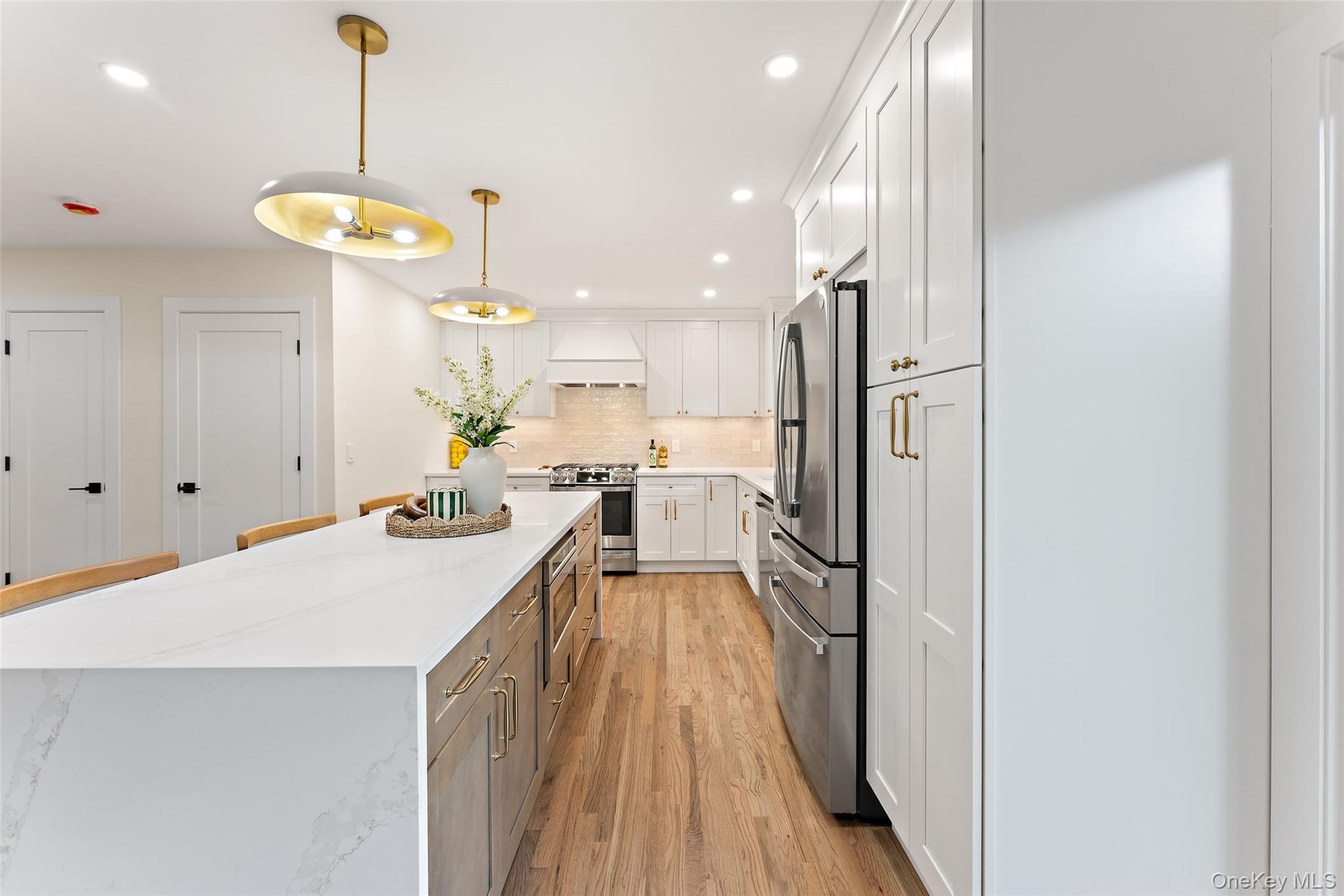 153 Waverly Road Scarsdale, NY 10583 - Photo 9 of 44 Large 8 Foot island with microwave drawer