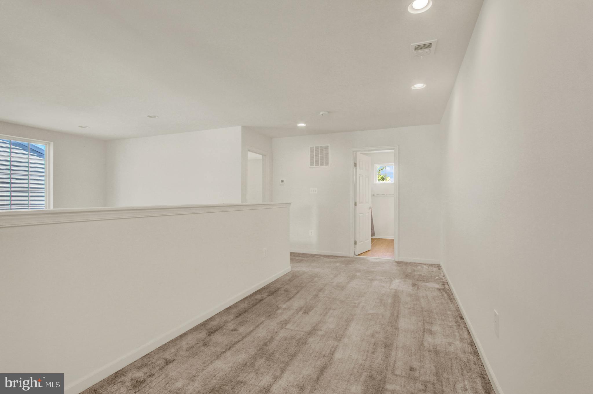 320 Maple Drive Hanover, PA 17331 - Photo 11 of 23 a view of an empty room with wooden floor