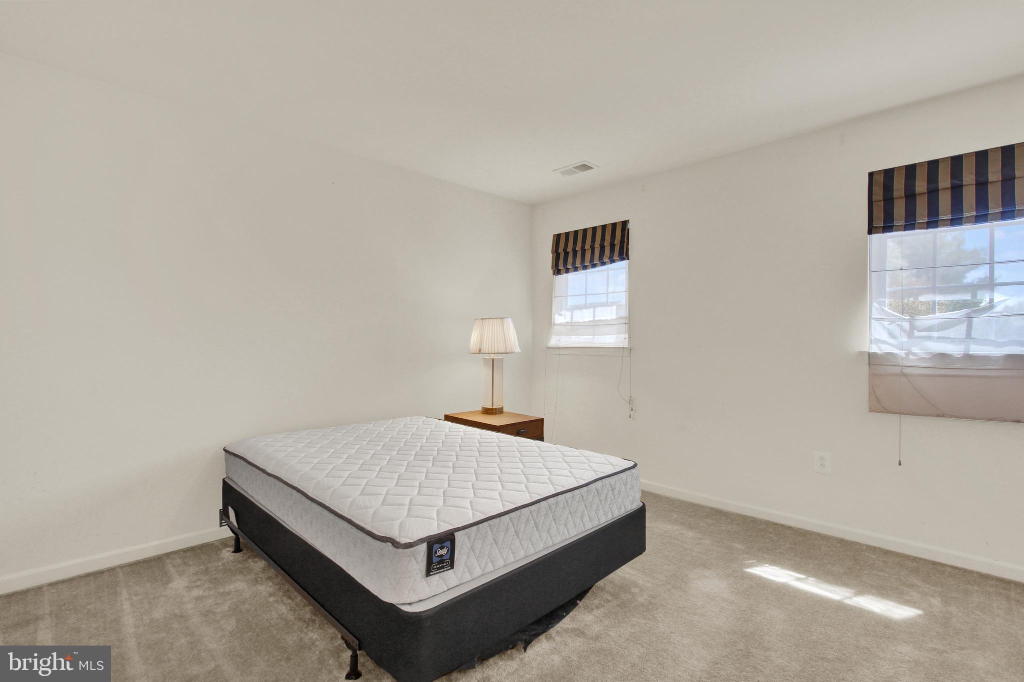 320 Maple Drive Hanover, PA 17331 - Photo 12 of 23 a bedroom with a bed and window