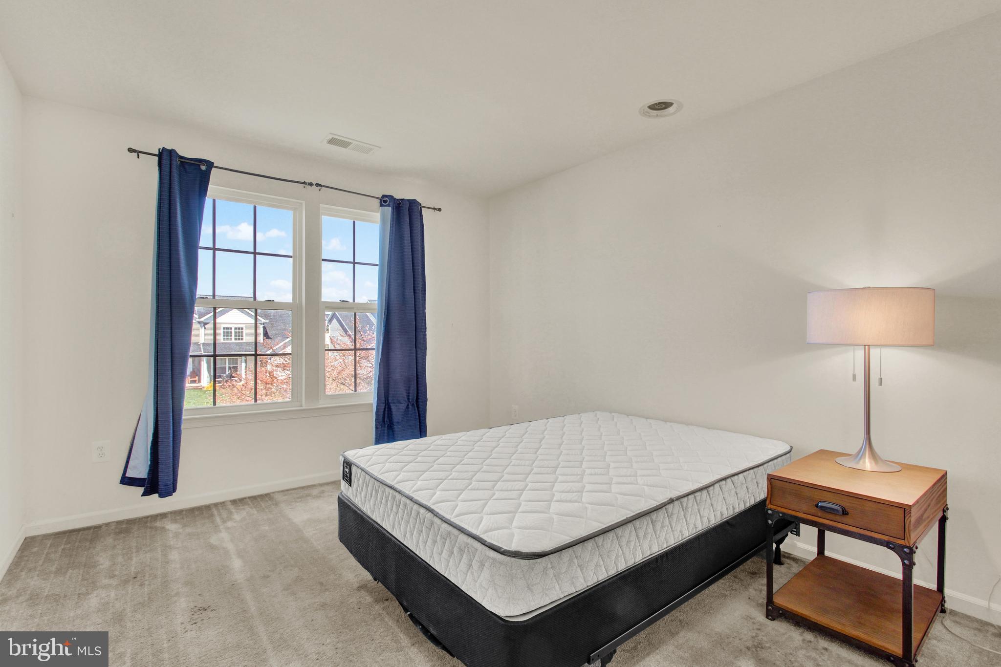 320 Maple Drive Hanover, PA 17331 - Photo 13 of 23 a bedroom with a bed and a window