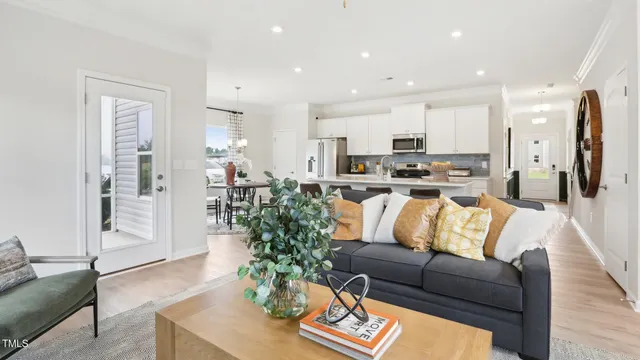 an empty room with a window and a fireplace