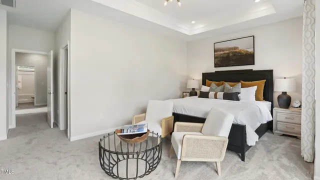 a utility room with wooden floor washer and dryer