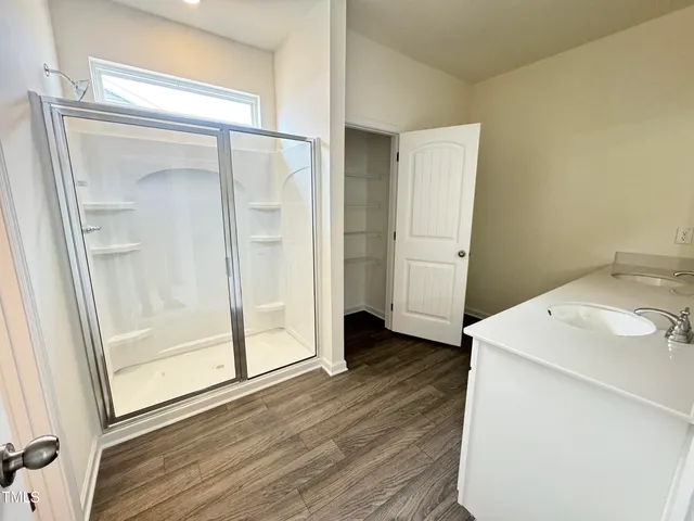 a view of a room with racks on the wall