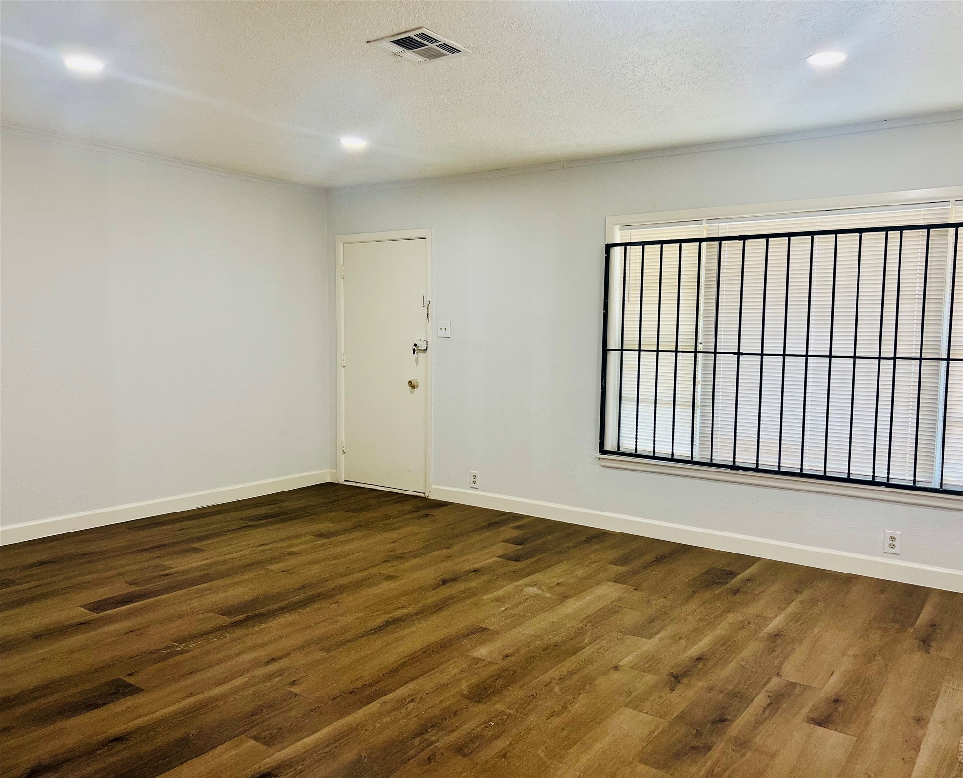 7328 Bauman Road Houston, TX 77022 - Photo 5 of 12 a view of an empty room