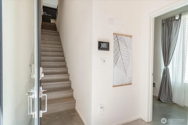 a view of entryway with wooden floor