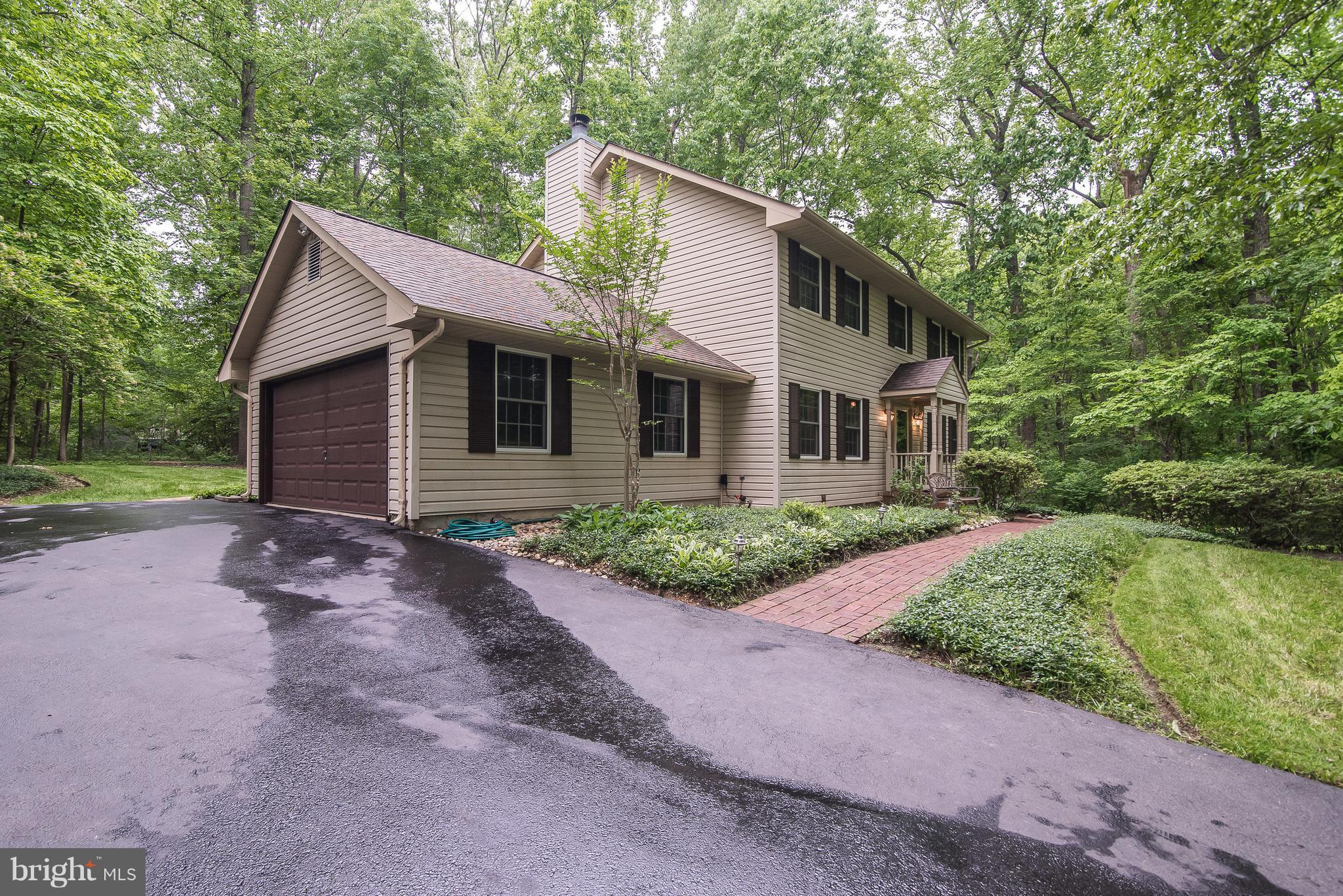 3190 Rolling Road Edgewater, MD 21037 - Photo 2 of 30 Tucked into lush woods! Meticulously landscaped!