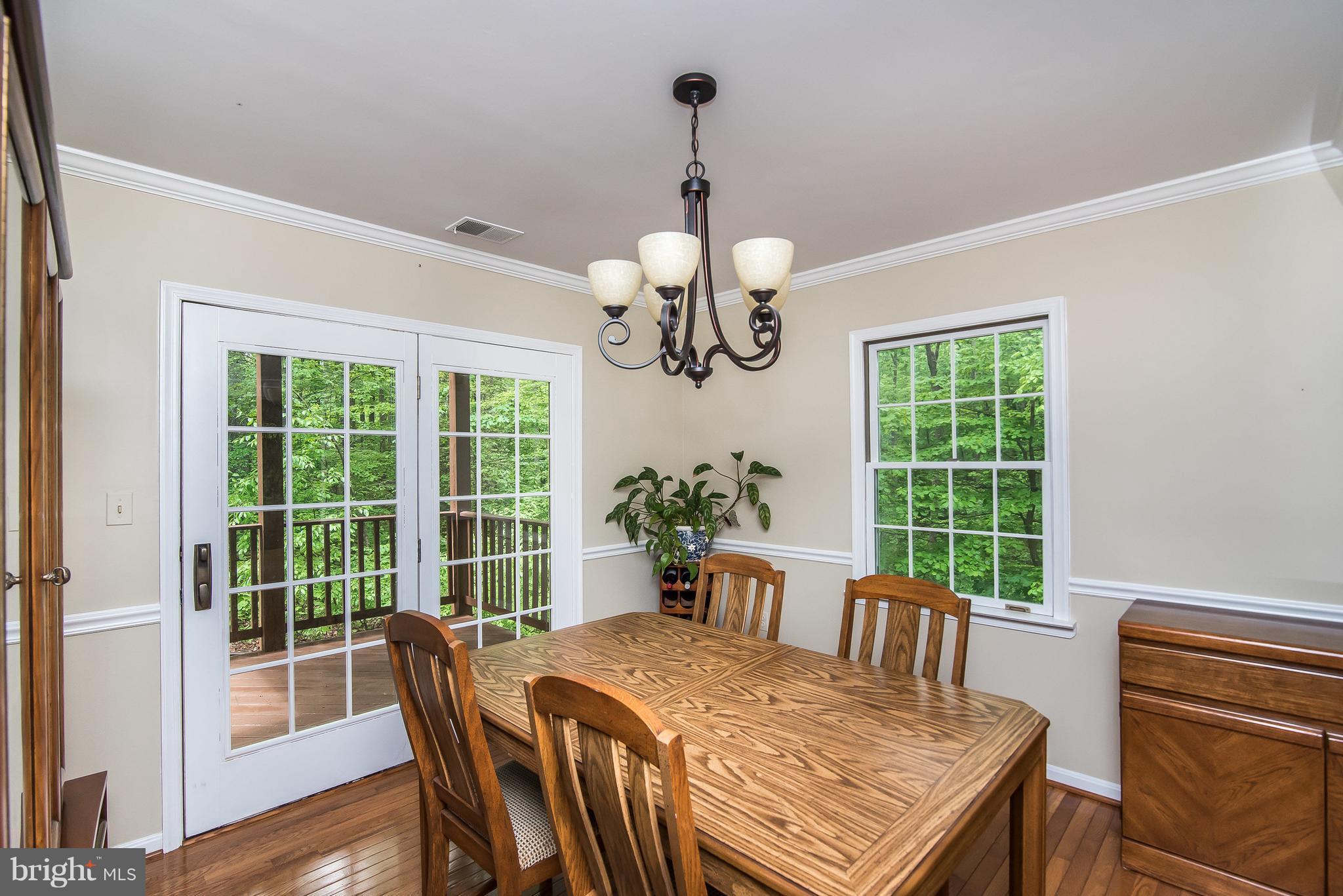 3190 Rolling Road Edgewater, MD 21037 - Photo 11 of 30 Dining Room opens to deck