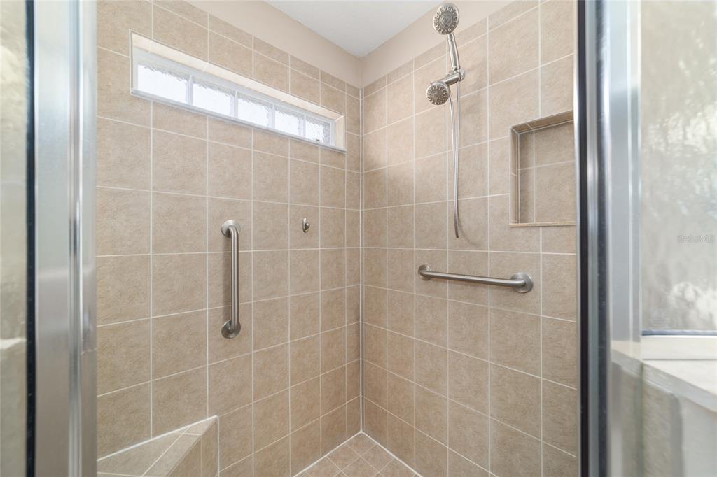 16369 Southwest 14th Avenue Road Ocala, FL 34473 - Photo 30 of 49 a bathroom with a shower