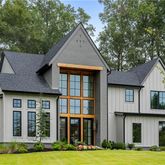 a front view of a house with yard