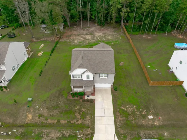 a view of a lake with a house