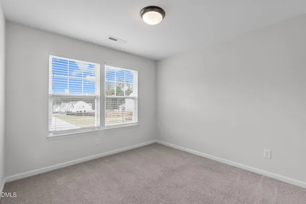 a bathroom with a sink a vanity and a mirror