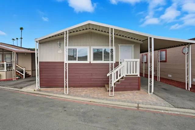 a front view of a house with a garage