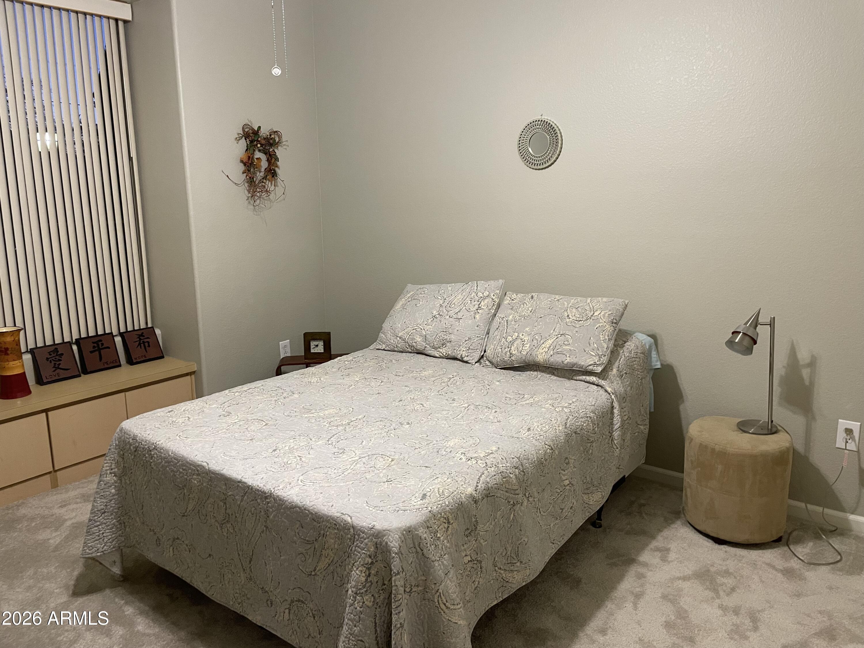 5303 North 7th Street, Unit 113 Phoenix, AZ 85014 - Photo 13 of 21 a bedroom with a bed and a window