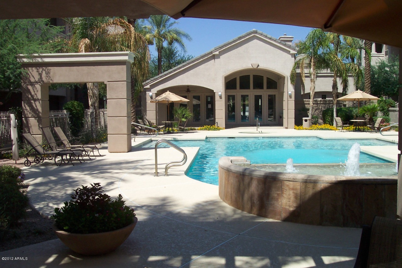5303 North 7th Street, Unit 113 Phoenix, AZ 85014 - Photo 2 of 21 a view of a house with backyard and porch