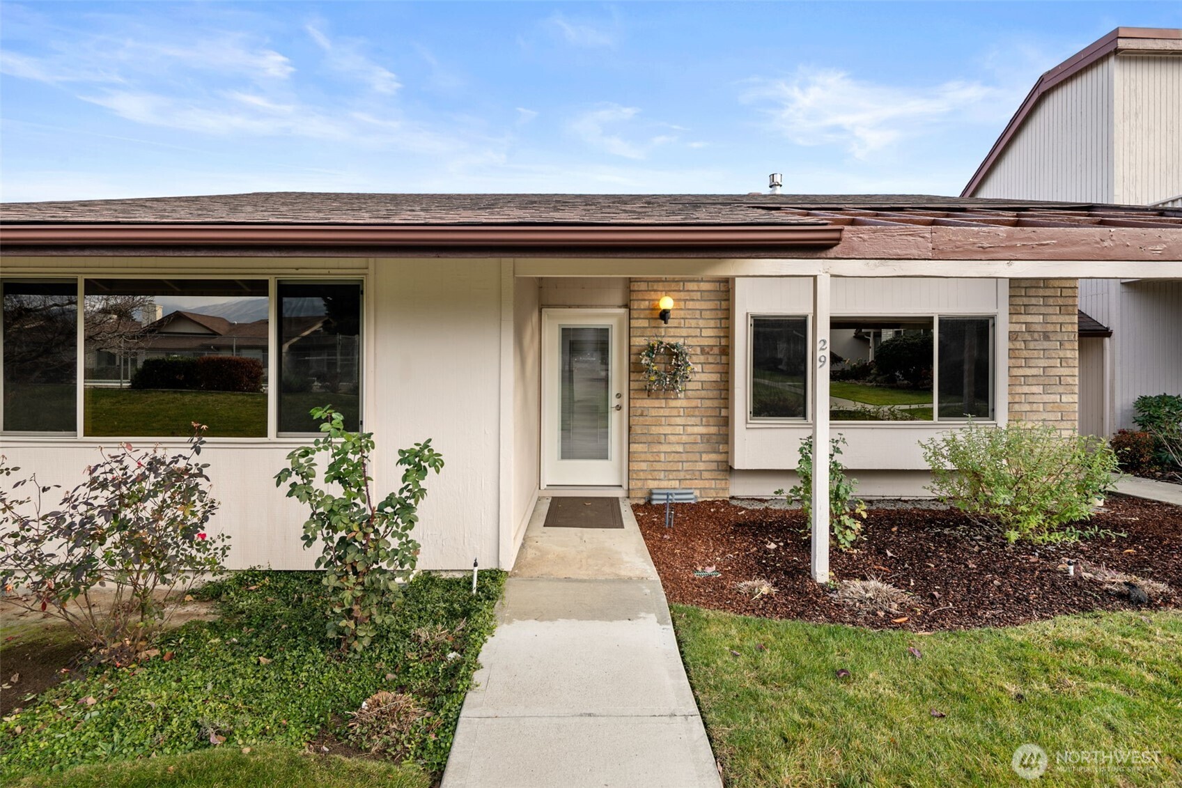 300 South Elliott Avenue, Unit 29 Wenatchee, WA 98801 - Photo 1 of 36 front view of a house with a porch