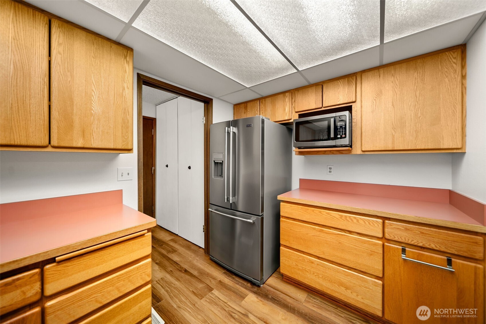 300 South Elliott Avenue, Unit 29 Wenatchee, WA 98801 - Photo 16 of 36 a kitchen with stainless steel appliances white cabinets and a refrigerator