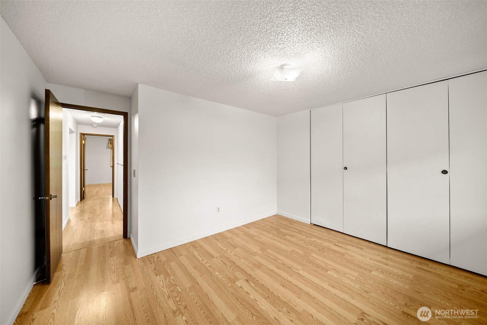300 South Elliott Avenue, Unit 29 Wenatchee, WA 98801 - Photo 29 of 36 a view of empty room with wooden floor