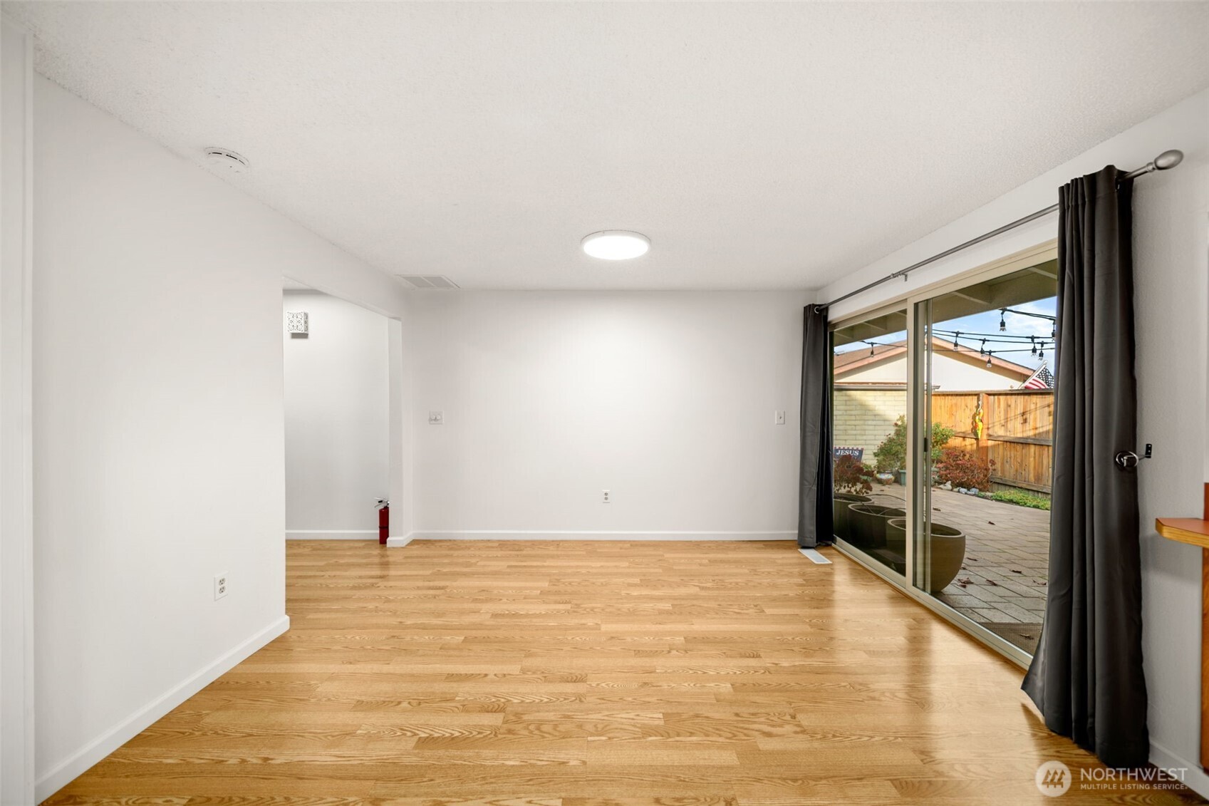 300 South Elliott Avenue, Unit 29 Wenatchee, WA 98801 - Photo 9 of 36 a view of empty room with wooden floor and fan