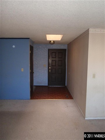 235 Ring Road Dayton, NV 89403 - Photo 10 of 13 a view of an empty room with a window