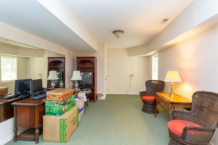 8609 Seagate Drive Raleigh, NC 27615 - Photo 23 of 28 Perfect area to set up for pool table, work out room! Basement has separate outside entrance. More Heated and Cooled Basemnet