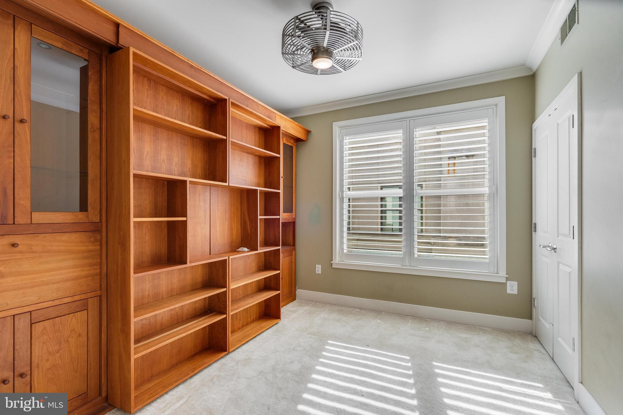 815 North Patrick Street, Unit 402 Alexandria, VA 22314 - Photo 19 of 23 a view of an empty room with a window