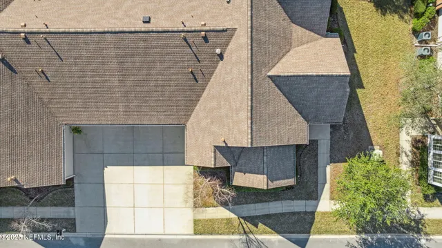 a room with lots of books and a book shelf