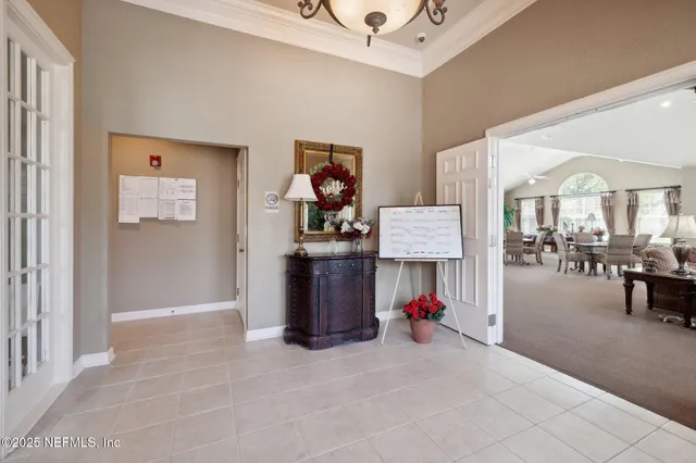 a view of a house with backyard porch and sitting area