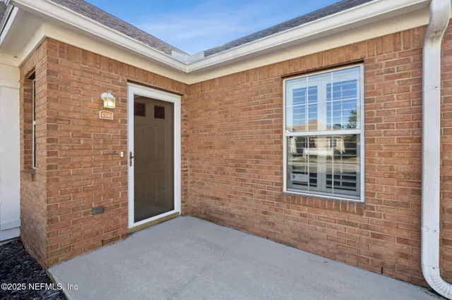 a bedroom with a bed and a fireplace