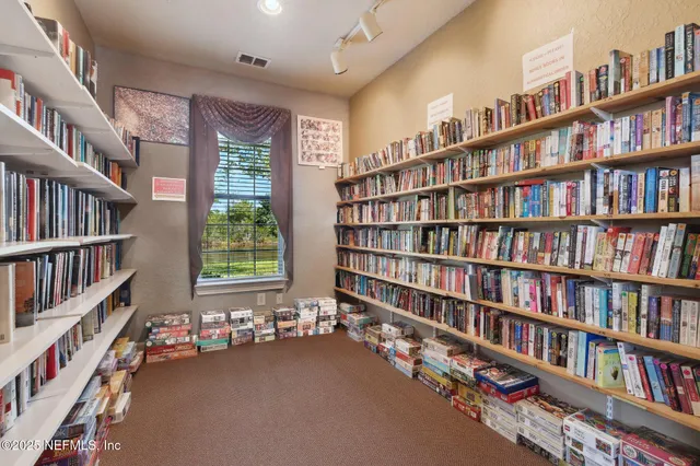 an aerial view of residential house with an ocean view
