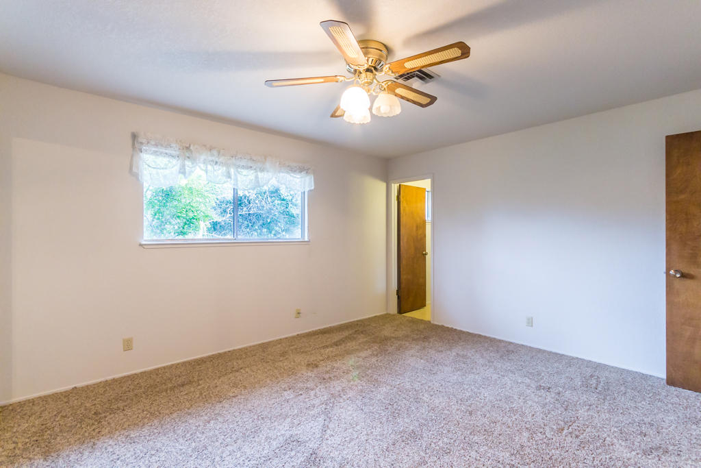 12651 Williamson Road Redding, CA 96003 - Photo 16 of 39 a view of an empty room with a window