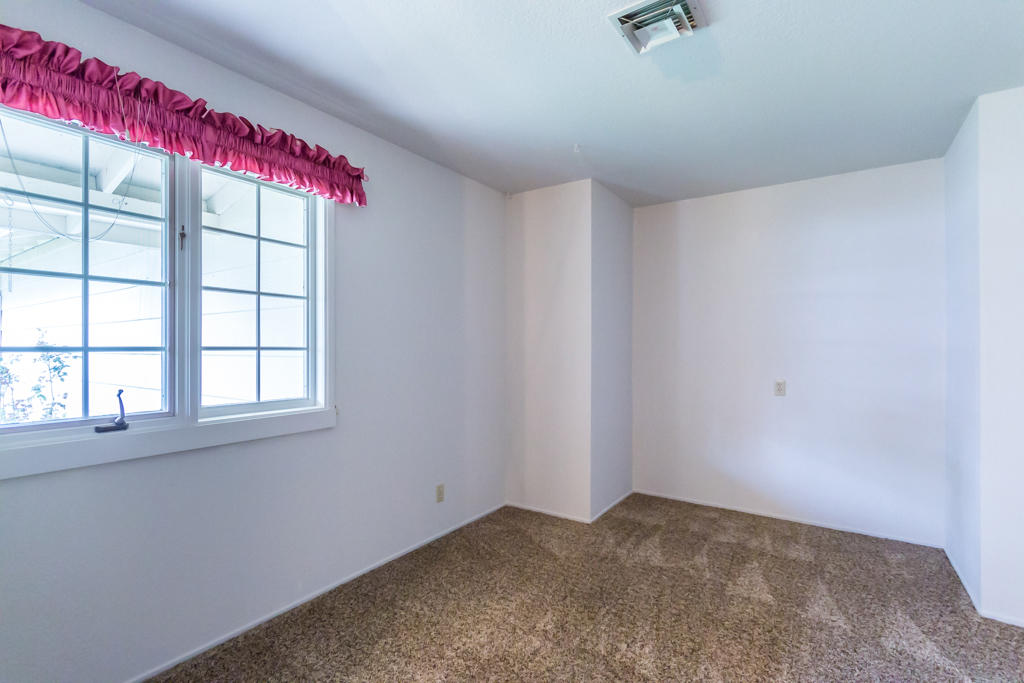 12651 Williamson Road Redding, CA 96003 - Photo 20 of 39 an empty room with windows