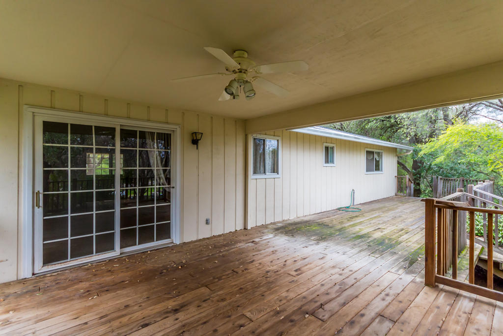 12651 Williamson Road Redding, CA 96003 - Photo 24 of 39 a view of empty room with wooden floor and fence