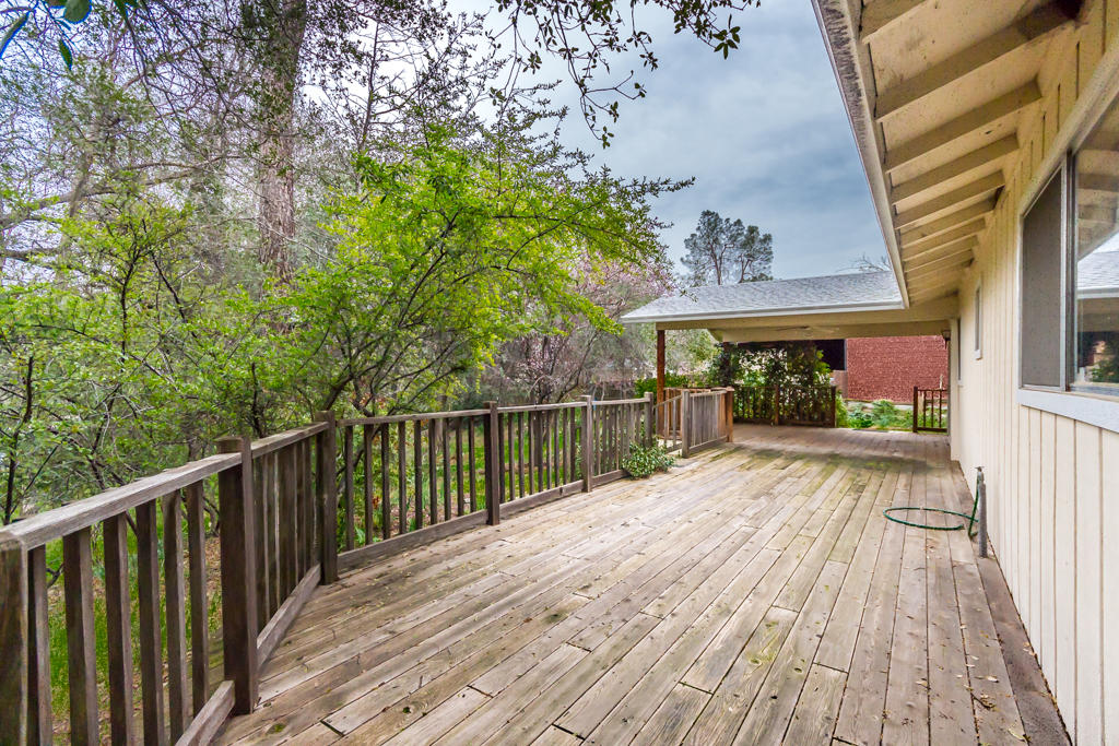 12651 Williamson Road Redding, CA 96003 - Photo 25 of 39 a view of balcony with wooden floor and outdoor space