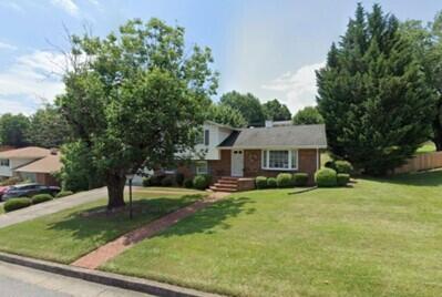 5820 Castle Rock Road Roanoke, VA 24018 - Photo 1 of 1 a view of a house with a yard