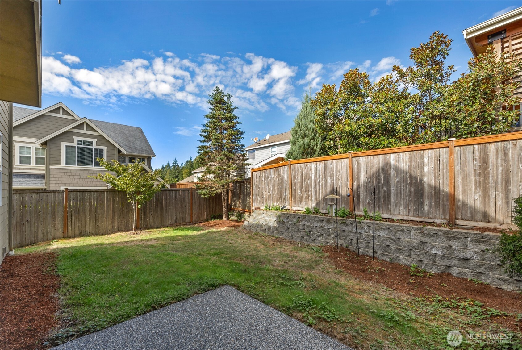 3605 231 Place Southeast Bothell, WA 98021 - Photo 26 of 38 a view of a house with a yard