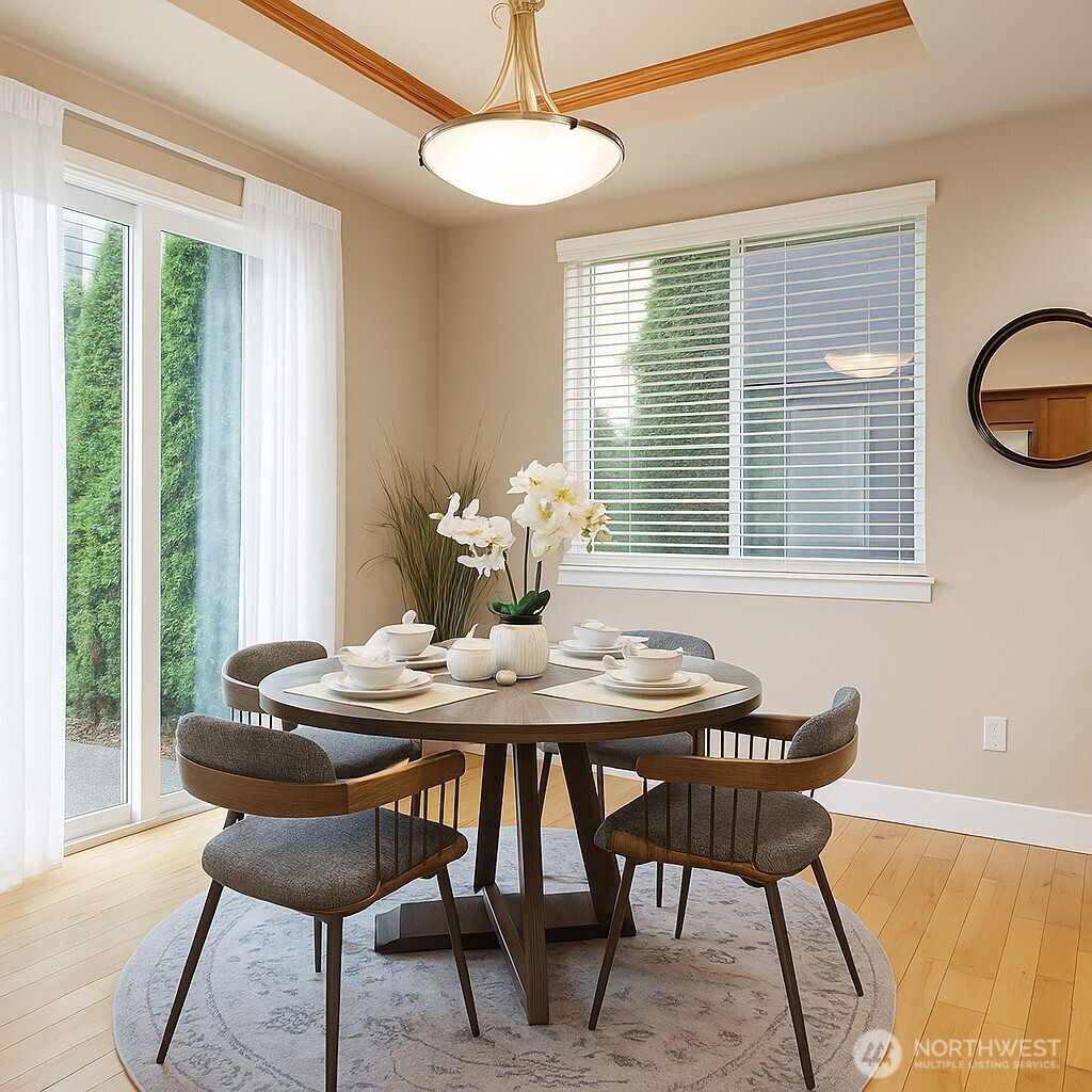 3605 231 Place Southeast Bothell, WA 98021 - Photo 9 of 38 a view of a dining room with furniture window and outside view