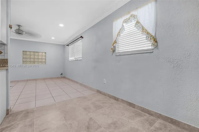 an empty room with windows