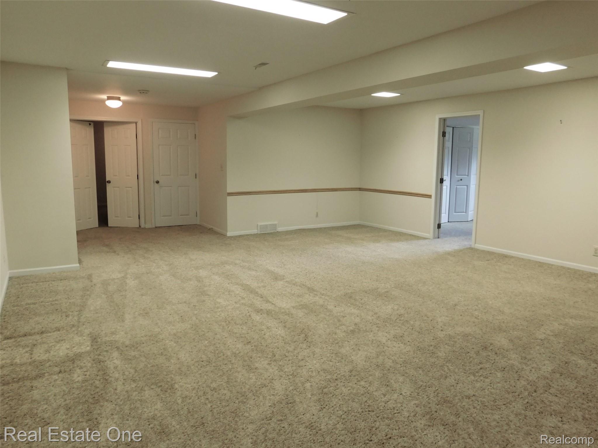 565 Augusta Drive Rochester, MI 48309 - Photo 20 of 30 LL w/Double Door Entry to Finished Areas