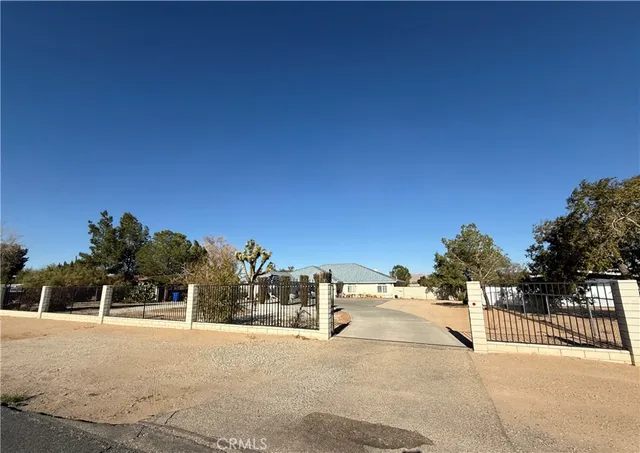 wooden floor in an empty room with a mirror