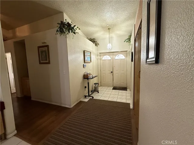 a kitchen with a sink stainless steel appliances and cabinets