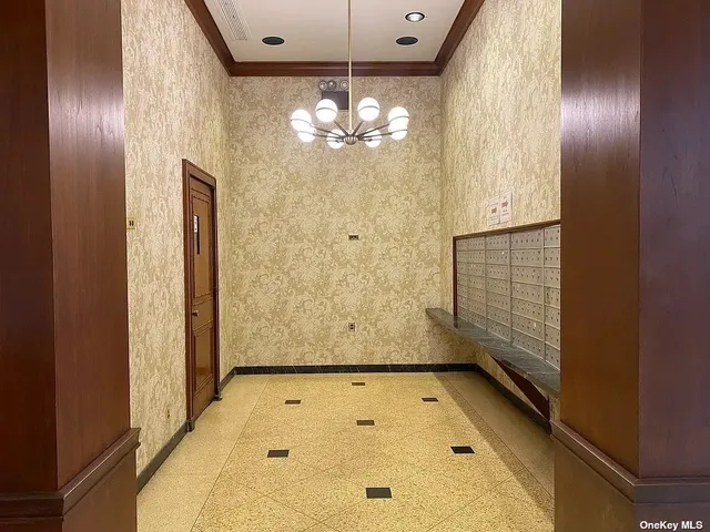 a view of bathroom with chandelier
