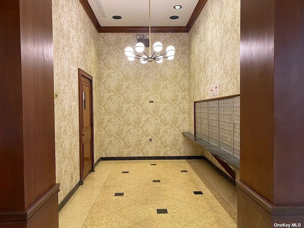 41-40 Union Street, Unit D Queens, NY 11355 - Photo 18 of 18 a view of bathroom with chandelier