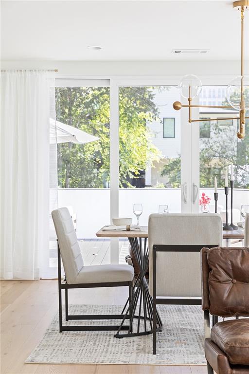1205 Holly Street Northwest, Unit B Atlanta, GA 30318 - Photo 15 of 81 a living room with furniture a window and a table