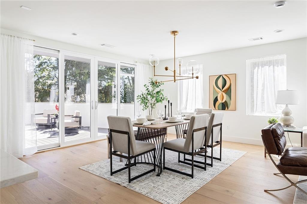 1205 Holly Street Northwest, Unit B Atlanta, GA 30318 - Photo 16 of 81 a view of a livingroom with furniture window and outside view