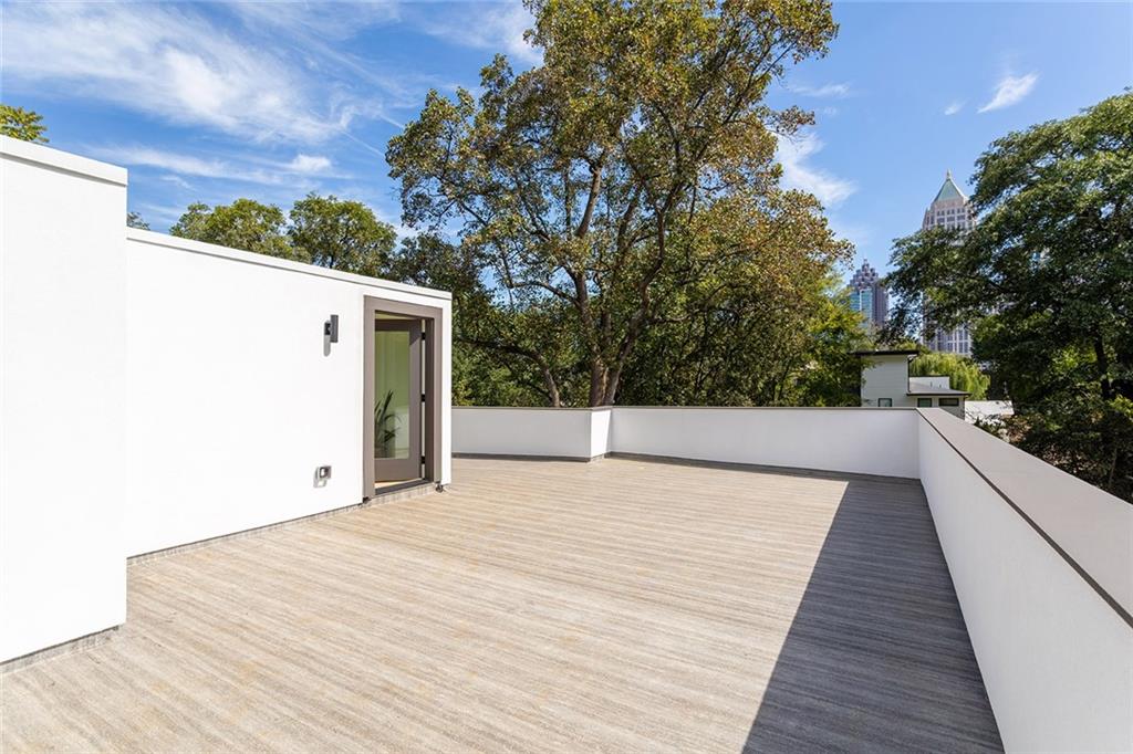 1205 Holly Street Northwest, Unit B Atlanta, GA 30318 - Photo 38 of 81 a view of a terrace with sky view